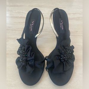 Women size 10 black satin sandals 4” heel. Gorgeous and sexy!